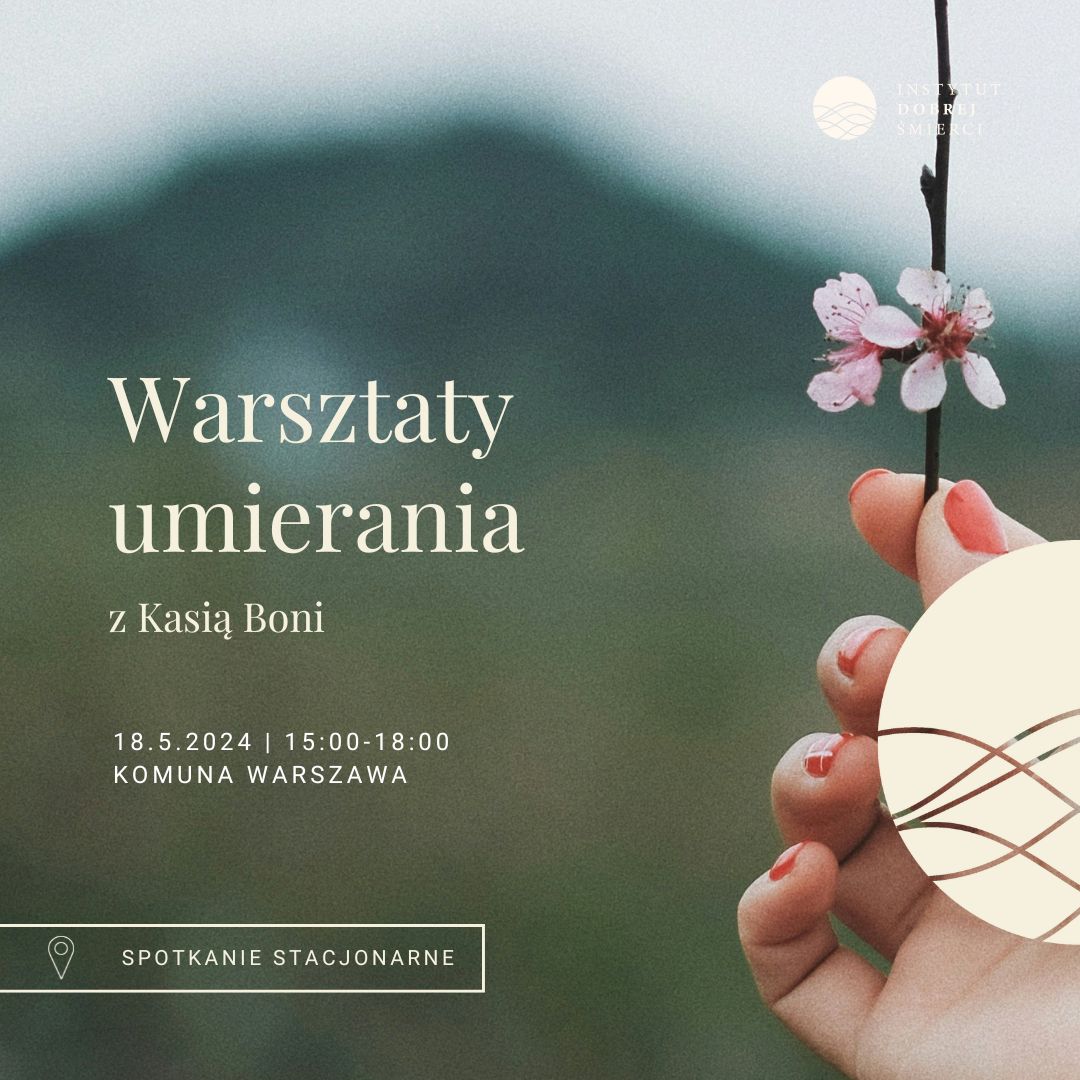 Zdjęcie przedstawia dłoń trzymającą gąłązkę z kwiatem.